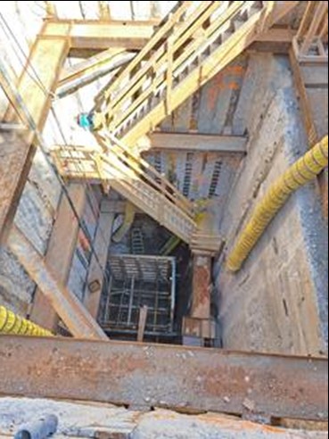 Shaft caisson work and excavation for elevator E2