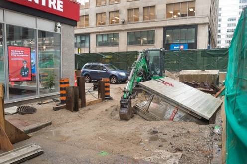 Temporary excavation at E3 Street Level for the installation of the vent shaft for the Melinda Exit closure.