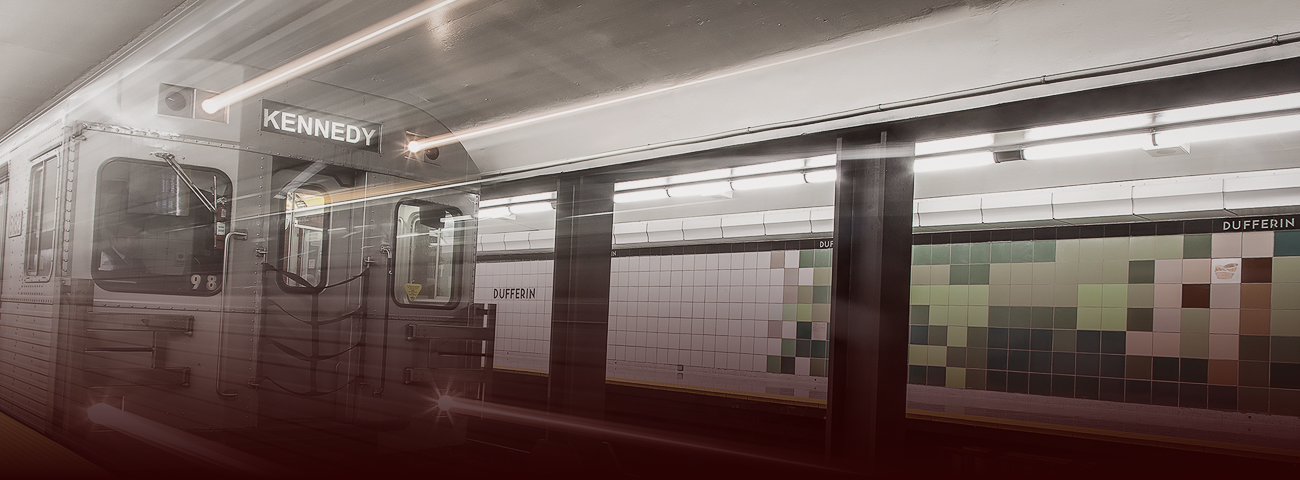 Image of a subway entering Dufferin Station