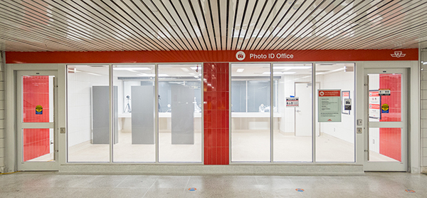 Red and white exterior of the Photo ID Office at Bathurst Station.