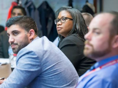 People listening at a conference