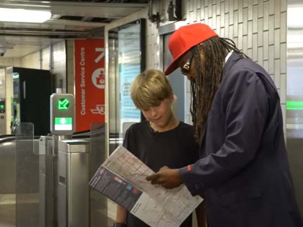 Collector helping customer find directions with a map