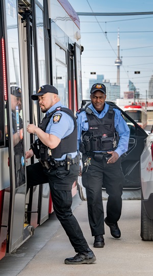 Two Special Constables boarding a streetcar