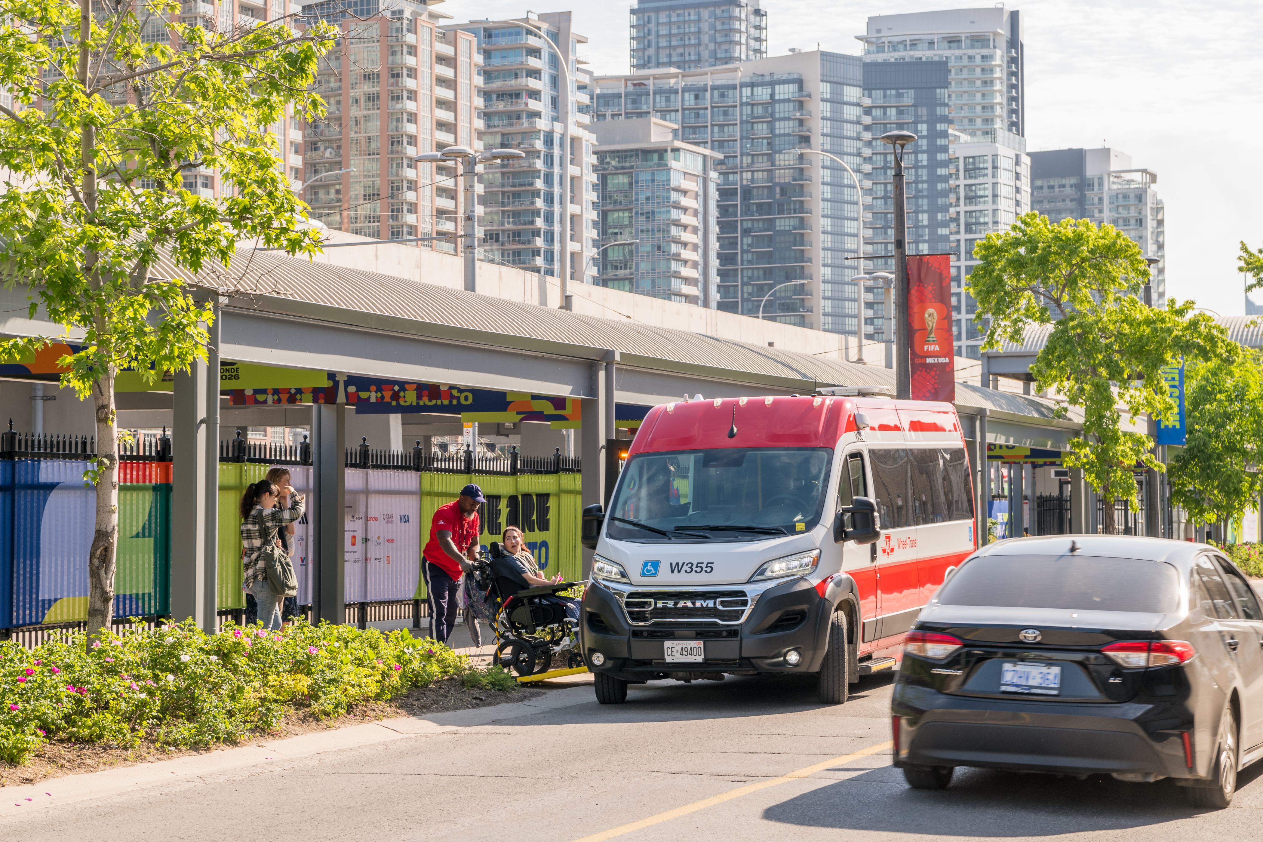 A TTC Customer boarding a Wheel-Trans bus at Exhibition Loop.