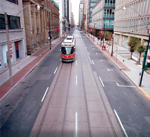 Fourth image of four, a TTC streetcar is positioned in the same spot, clearly showing the decrease in road congestion.