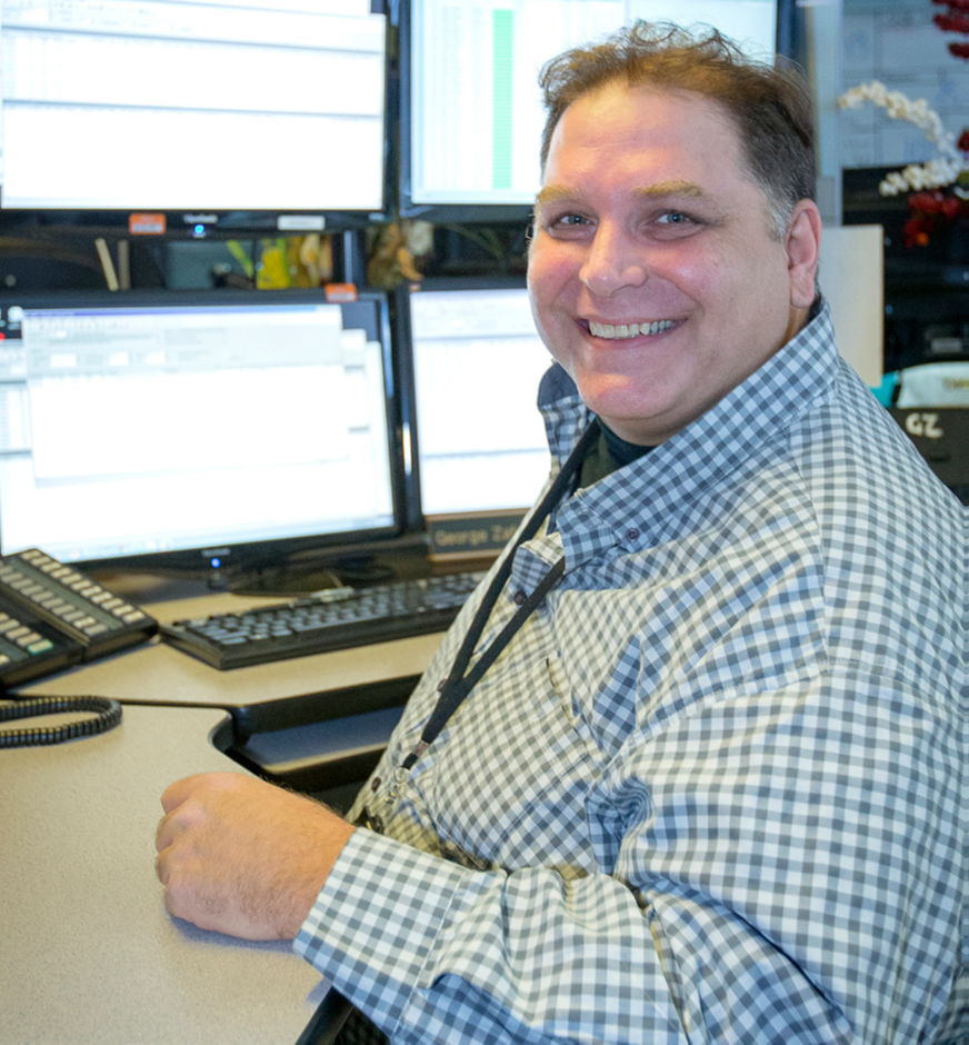 A staff member of the Wheel-Trans Reservations and Scheduling team.