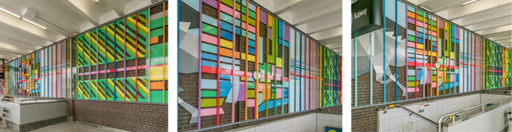 Linear art display on exterior station wall. 
