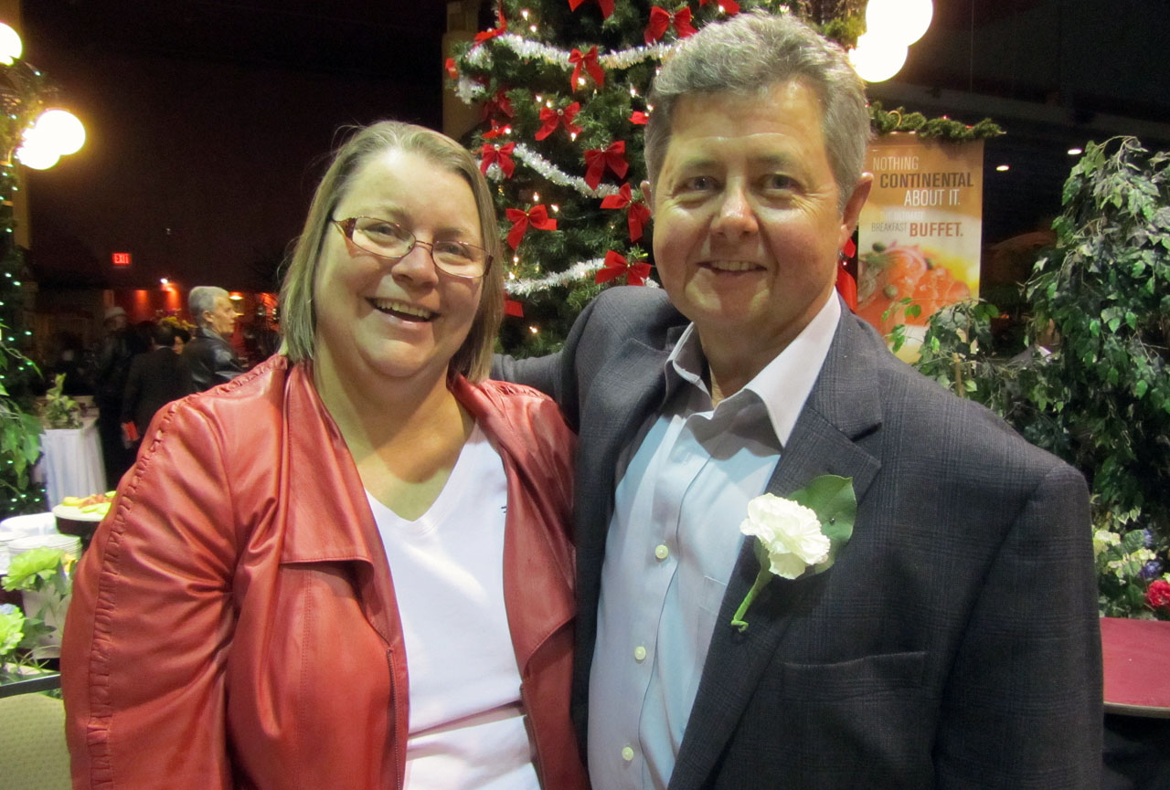 RICK HOLLI, 29 years, 3 months Engineering, Construction and Expansions Rick Holli and his wife, Beth.