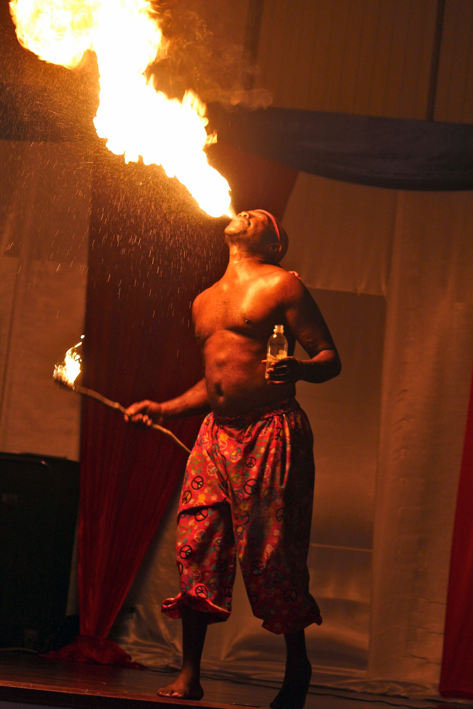 Performer playing with fire, do not try this at home! In Montego Bay, Jamaica with my family. Photo courtesy Noor Al Shaikh, EC and E