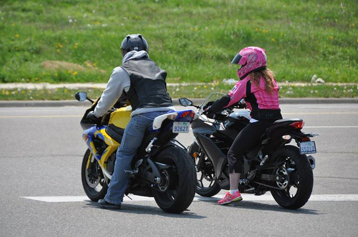 First summer on my own bike, Biker on the left is Jeffrey Johnson from Greenwood Nights. Photo courtesy: Jessica Klamann, IT Services