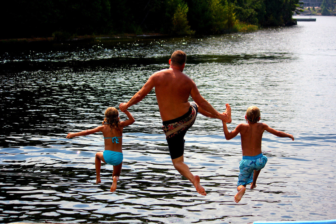 My husband and children jumping off the dock all day long. Photo courtesy Elianna Anton
