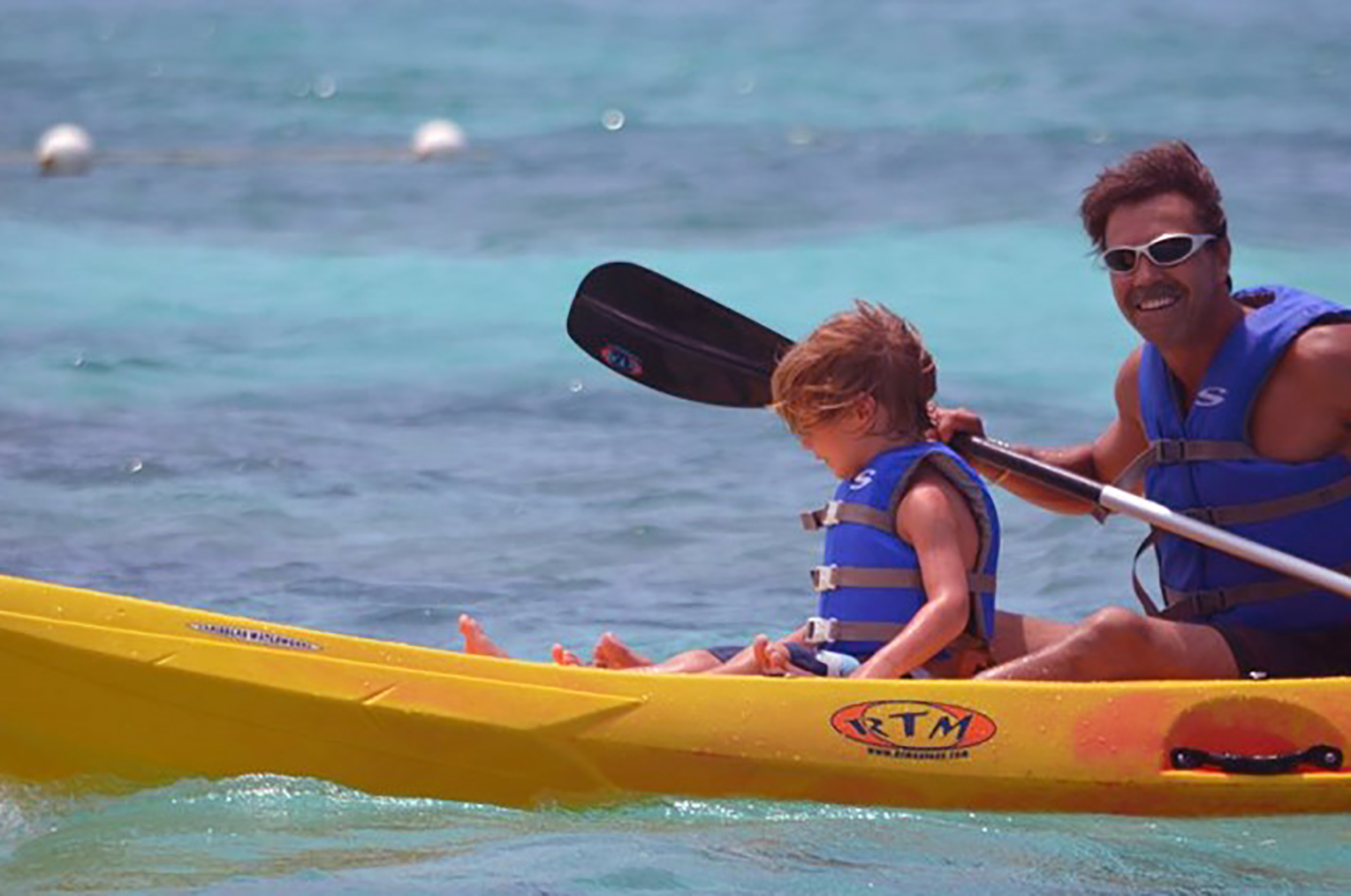 Paddling in Jamaica with my nephew, Daniel. Photo courtesy Philip Jules
