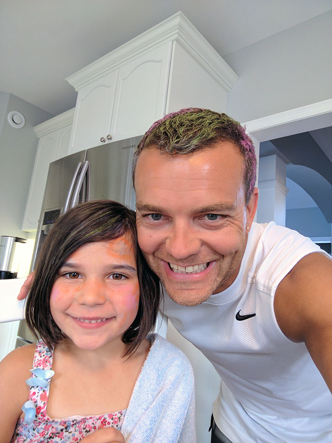 Rayah does her daddy's hair. Photo courtesy Shawn Silva