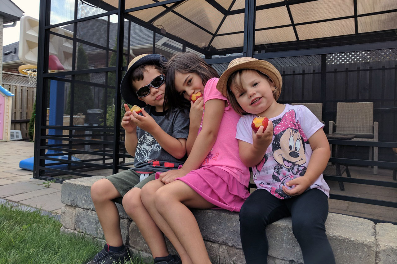 Kids enjoying a summer snack. Photo courtesy Shawn Silva