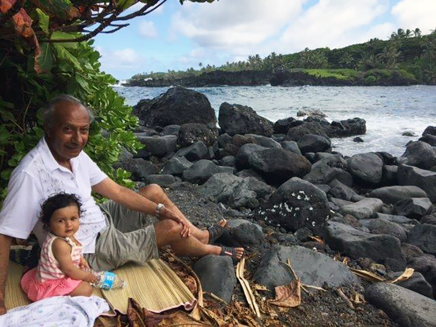 In Hawaii on the beach with my granddaughter, Arianna. Photo courtesy Amirali Jamal