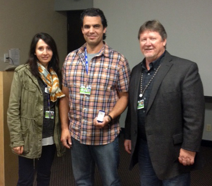 Recipient: Investigator Dan Welk, centre, accepted his 10-year pin. Location: Criminal Investigation Unit in Human Resources. Presenters: Human Resources Head Gemma Piemontese, left, and Staff Sergeant Dan Patrick, right.