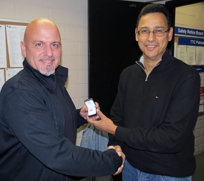 Recipient: Foreperson Gabriel Valentini, ledt, received his 10-year pin. Location: Elevating Devices in Plant Maintenance. Congratulated by: Elevating Devices Manager Dexter Collins, right.