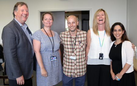 Recipient: Secretariat Services Co-ordinator Dawn McDonald, second from right, shares a laugh with co-workers Kevin Lee, Maria Di Mauro, Richard Harvey and Margarette Balanco on her 35th anniversary with the TTC. Location: Commission Services. Congratulated by: CEO Andy Byford, CFAO Vincent Rodo and Head Kevin Lee, left, who presented the milestone pin.
