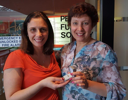Recipient: Pensions Estimates Assistant Rita Monaco, left, received her 15-year pin from Pension Officer Anna Puccia, right. Location: Pension Fund Society. Congratulated by: CEO Andy Byford and Pension Fund Society CEO Sean Hewitt (not pictured).