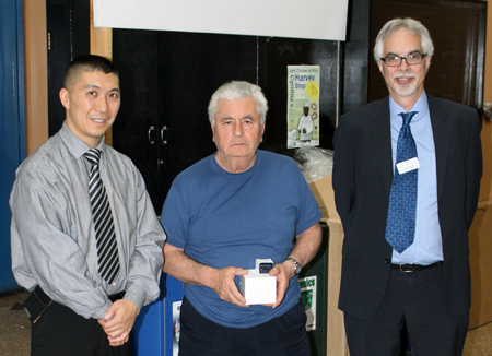 Recipient: Truck Repairperson Salvatore Zammito, centre, was presented with his milestone pin for 40 years of service at the Commission. Location: Harvey Shop. Congratulated by: Chief Operating Officer Gary Shortt, right, and Bus Maintenance and Shops Head Rich Wong, left.