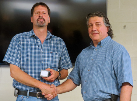 Left: Electrician Don Hartwick, 30 years. Congratulated by Supervisor Frank Cannella.