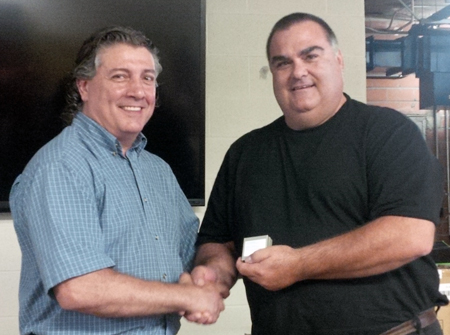Right Electrician David McConkey, 30 years. Congratulated by Supervisor Frank Cannella.