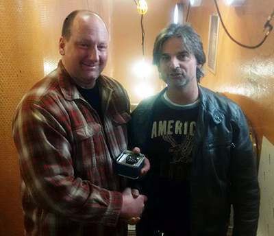 Recipient: Escalator Overhaul Mechanic Allan Pittman, left, receives his 25 year watch. Location: Elevating Devices in Plant Maintenance. Congratulated by: Foreperson Steve Roman.