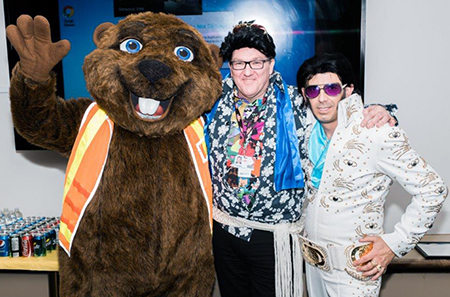 Recipient: IT Customer Services Director Kevin MacLeod, centre, was congratulated on reaching 30 years of service with the TTC. Location: IT Services Department. Congratulated by: Friends and co-workers and special guests, Barney Beaver and Elvis.