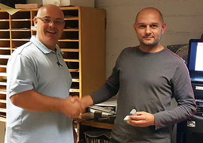 Recipient: Escalator Mechanic Walter Jakubasz, right, received his five year pin. Location: Plant Maintenance Department. Congratulated by: Foreperson Tom Lengyel, left.