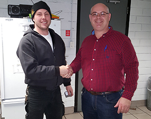 Recipient: Escalator Apprentice Daniel Van Winkle, left, received his five-year milestone pin. Location: Plant Maintenance, Elevating Devices. Congratulated by: Foreperson Tom Lengyel, left.