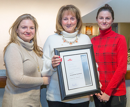 50 years of service: Assistant Timekeeping Payroll Jacqueline Southorn (now retired), with daughters, Jamie and Lindsey. Department: Service Centre.
