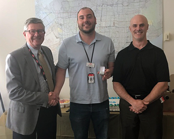 Recipient: Safety Assurance Officer Jason Trabucco, centre, received his 15-year long-service pin. Location: Safety and Environment Department. Congratulated by: Chief Safety Officer John O’Grady, left, and Safety Engineering Services Manager Andrew McKinnon, right.