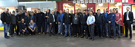 Employees at Greenwood recognized Senior Storeperson Santo Gallo for reaching three decades of service with the TTC and Storeperson Yusuf Ingar for attaining 10 years of service (front and centre). Location: Greenwood Warehouse. Congratulated by: Material and Procurement’s Acting Head Mike Piemontese.