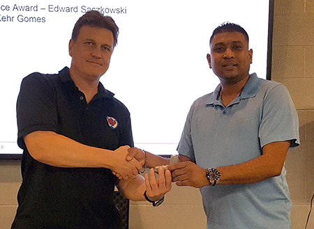 Recipient: Electrician Edward Saczkowski, left, celebrated his 30th anniversary with the Commission. Location: Elevating Devices Section in Plant Maintenance. Congratulated by: Foreperson Kehr Gomes, right.