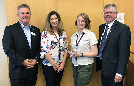 EHS Analyst Jennifer Cerini reached five years of service and was congratulated by CEO Rick Leary, SH&E Policy and Strategy Manager Betty Hasserjian and Safety and Environment Head John O’Grady.