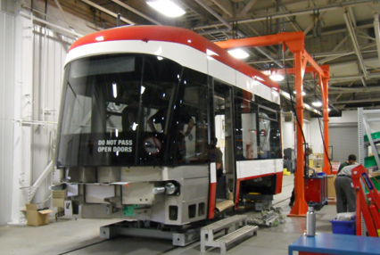 Low floor streetcar assembly.