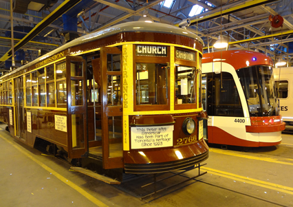 Future low floor streetcar mock up pictured with Peter Witt streetcar.