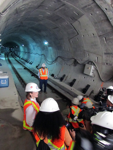 Director Joanna Kervin leads media tour of Spadina Extension on September. 9.