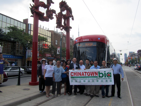Chinatown Business Association photo opportunity on Spadina route.