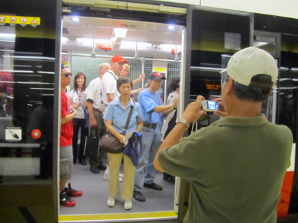 Streetcar riders posed for plenty of pictures on launch day.
