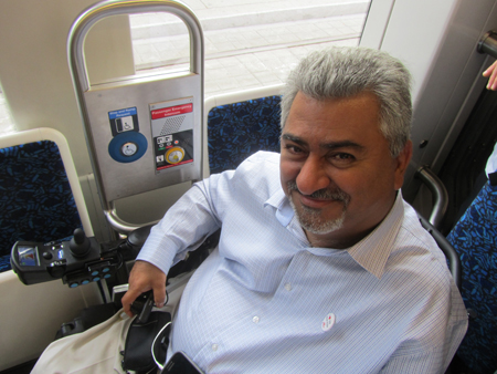 Advisory Committee on Accessible Transit Vice-Chair Mazin Aribi onboard new streetcar.