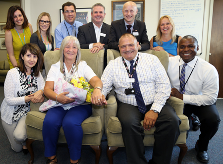 Frank and Barb engaged at TTC Head Office.