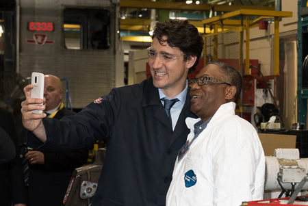 PM Trudeau with Axle Fitter Basil Ramsay.