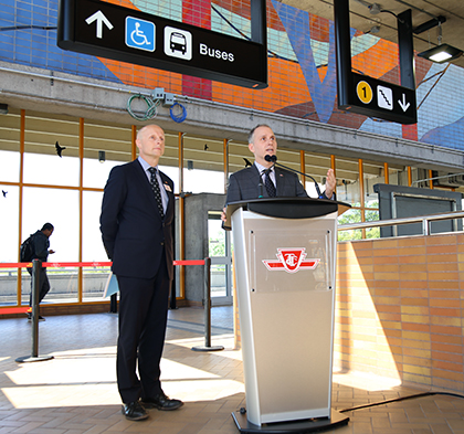 Express bus plan announcement at Lawrence West Station on June 8.