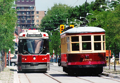 CLRV and Peter Witt streetcars on inaugural day of 510 Spadina, July 27, 1997.
